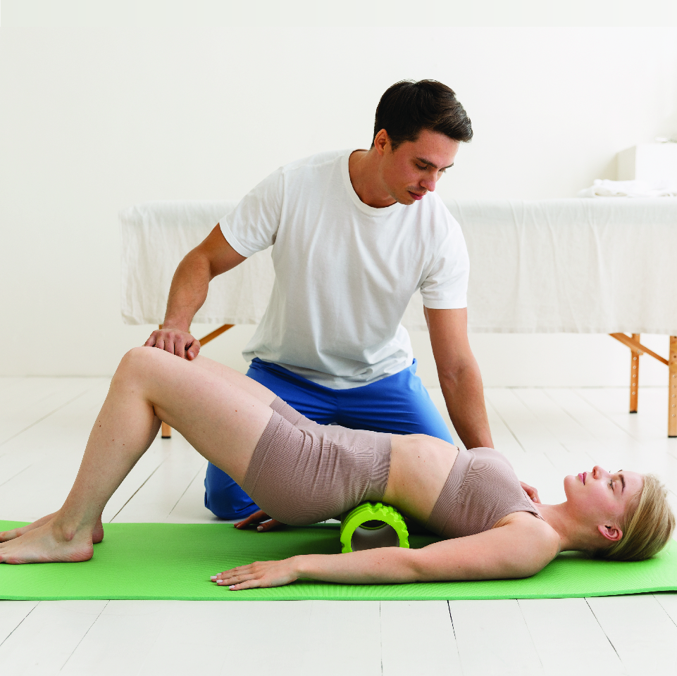 Physiotherapist explaining treatment plan at home